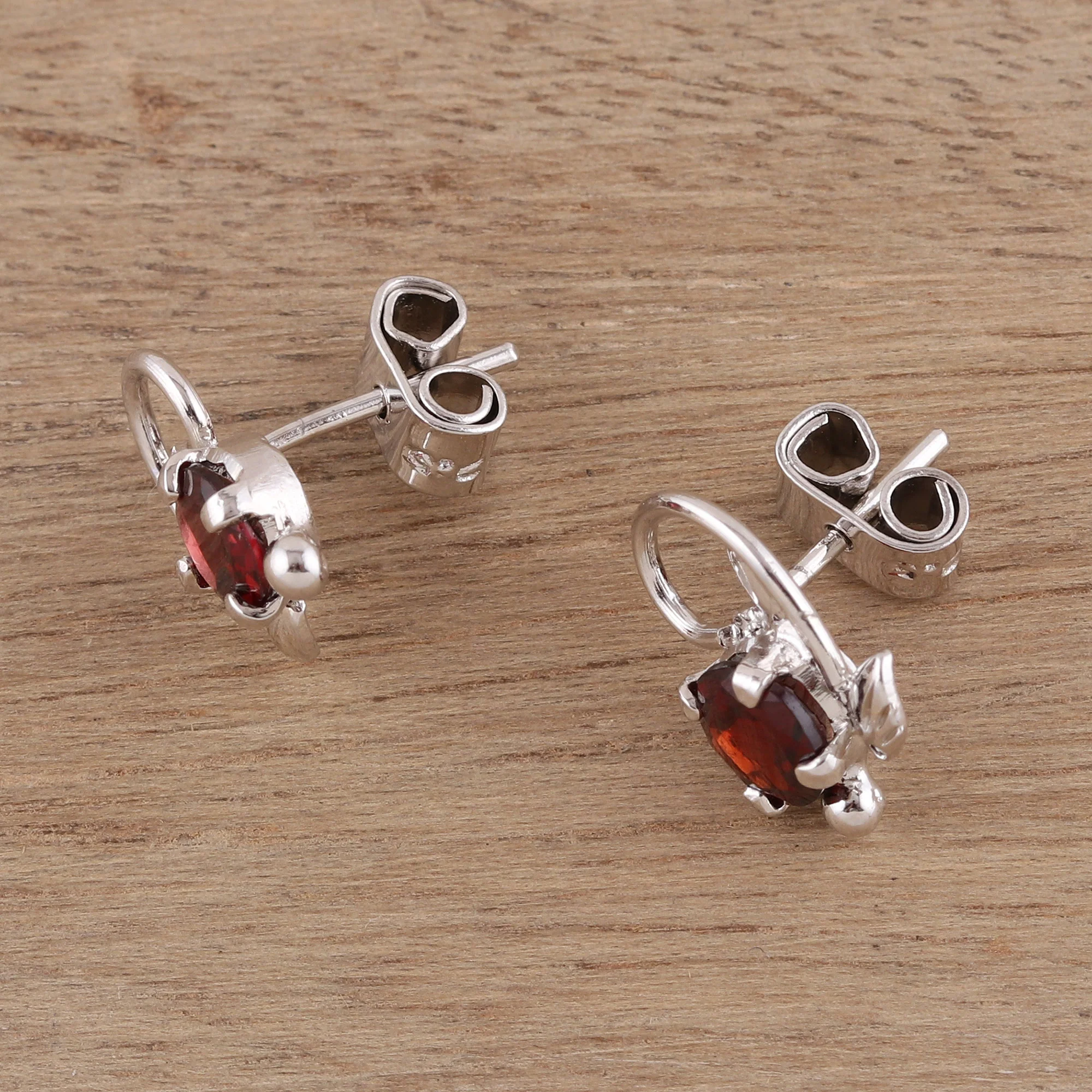 Blissful Radiance Leafy Rhodium Plated Garnet Stud Earrings from India - Image 3