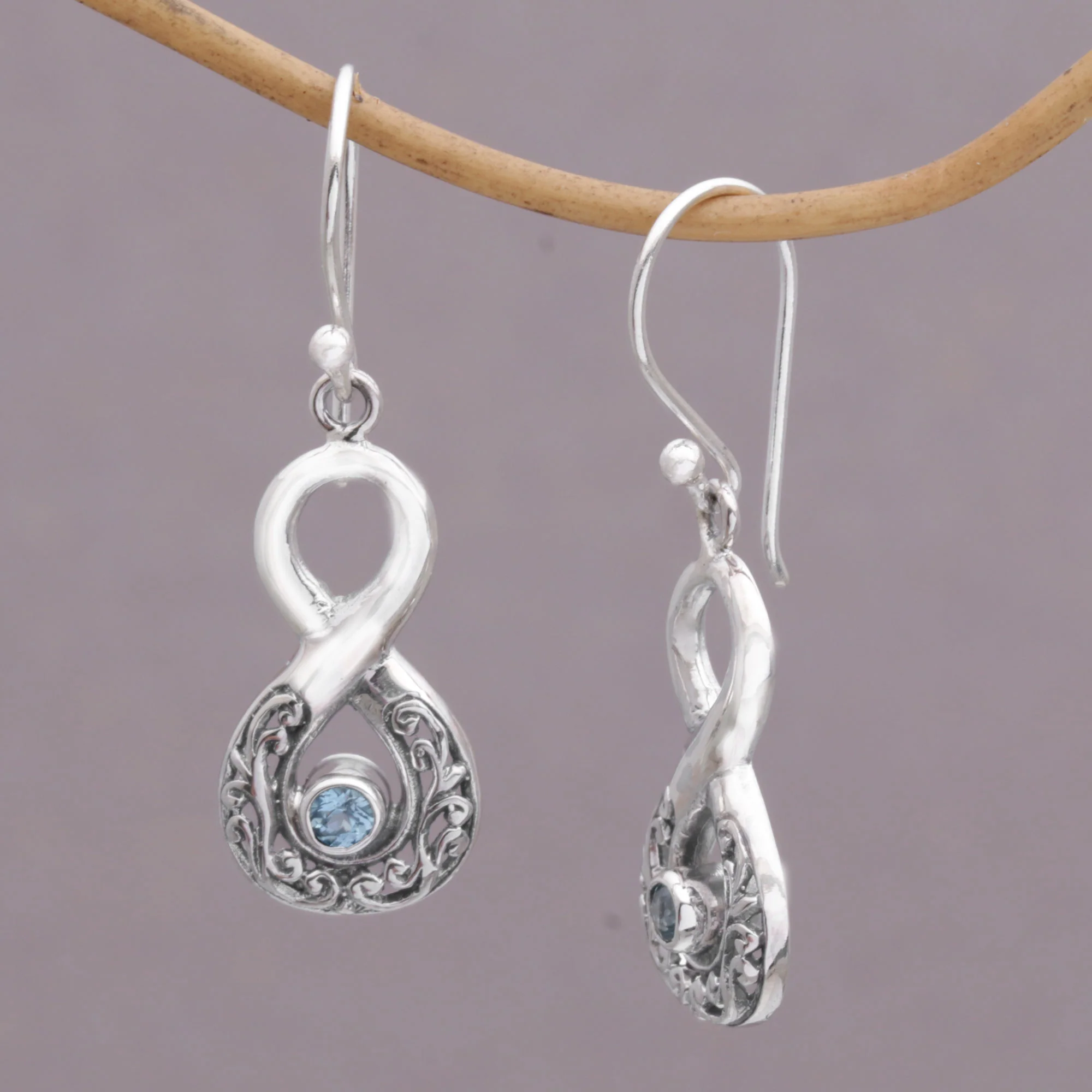 Blue Tangle Blue Topaz and Sterling Silver Looping Earrings from Bali - Image 3