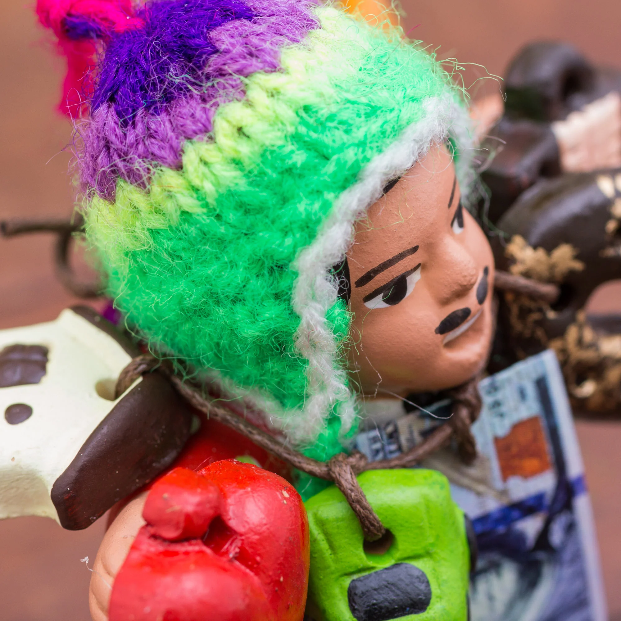 Ekeko of Abundance Hand Painted Ekeko Sculpture with Wool Cap from Peru - Image 4