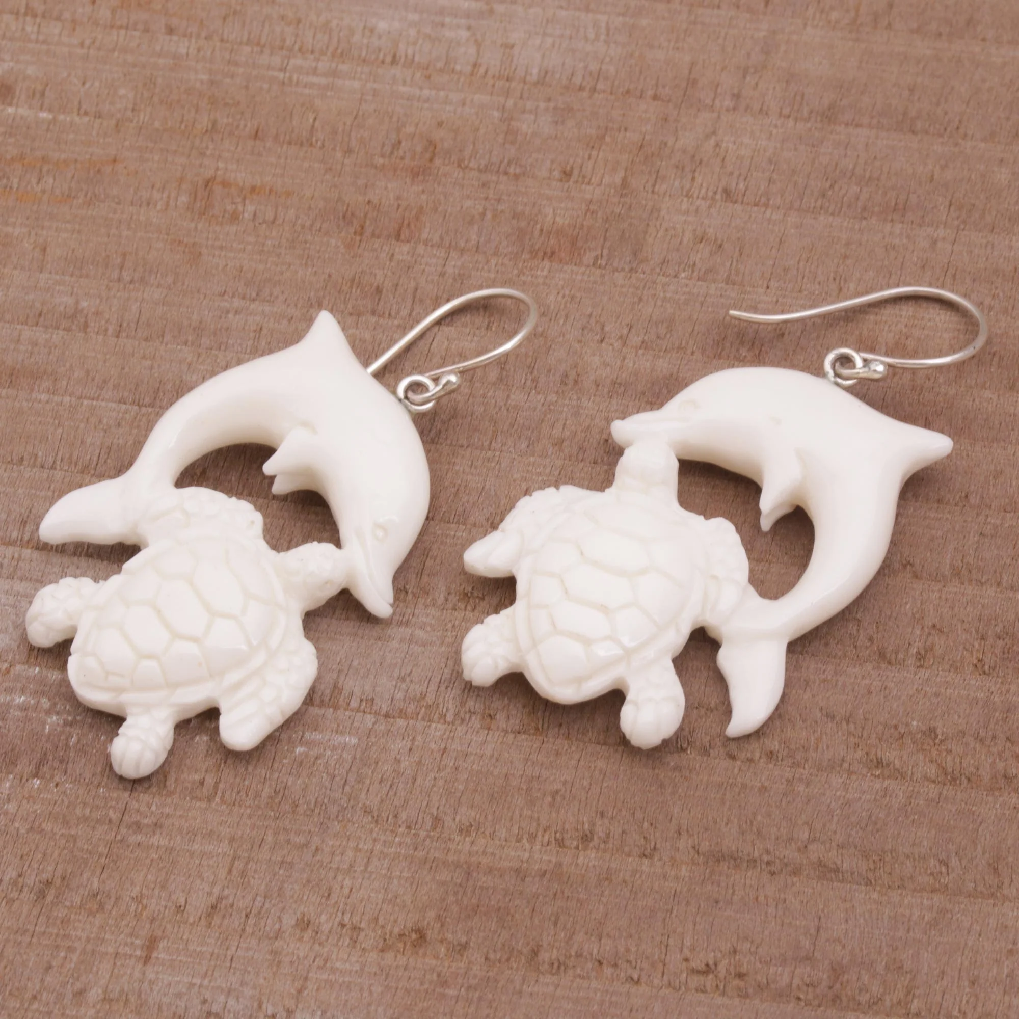 Friends Among the Waves Bone Dangle Earrings with Dolphin and Tortoise Theme - Image 5