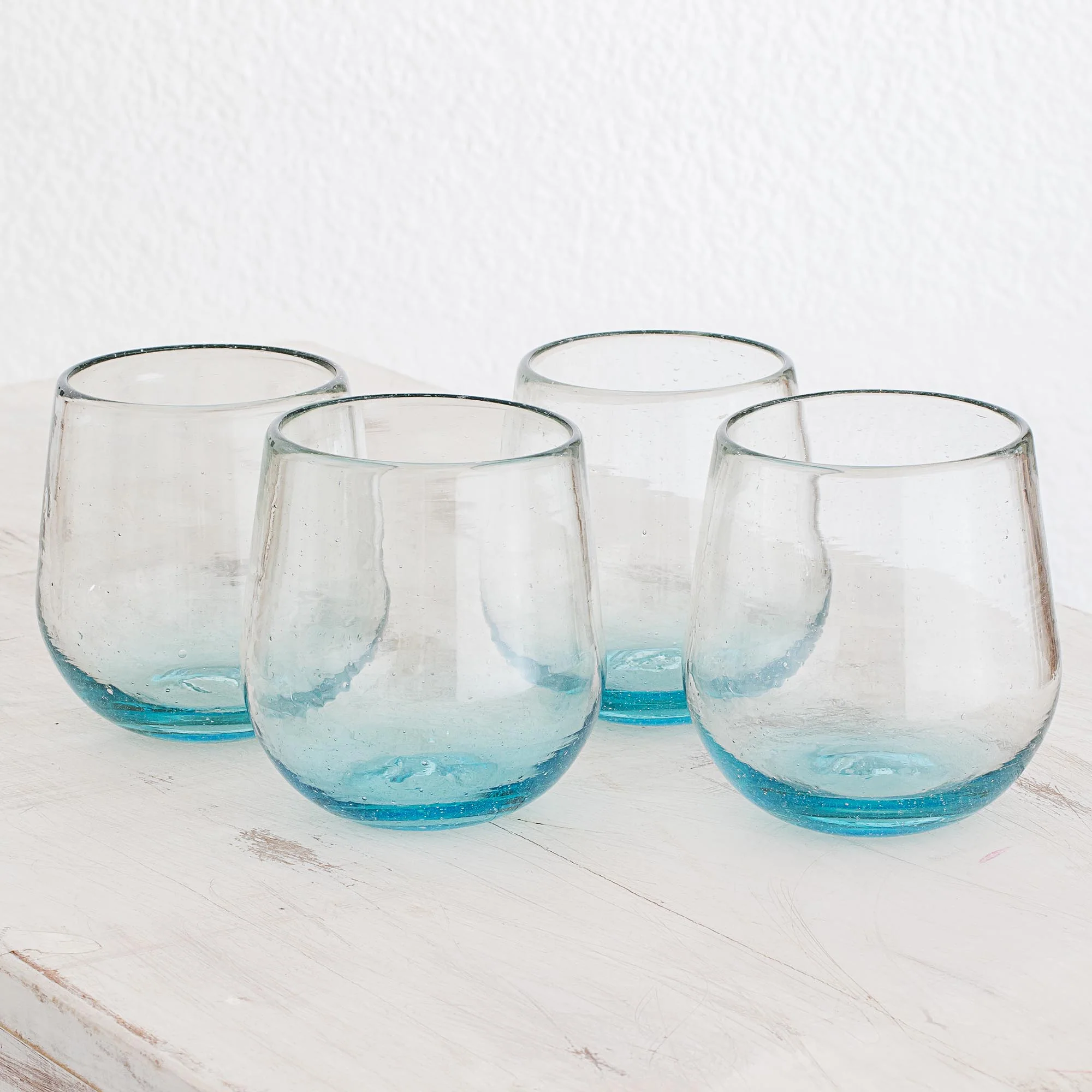 Glistening Sea Set of Four Recycled Glass Stemless Wine Glasses in Blue - Image 3